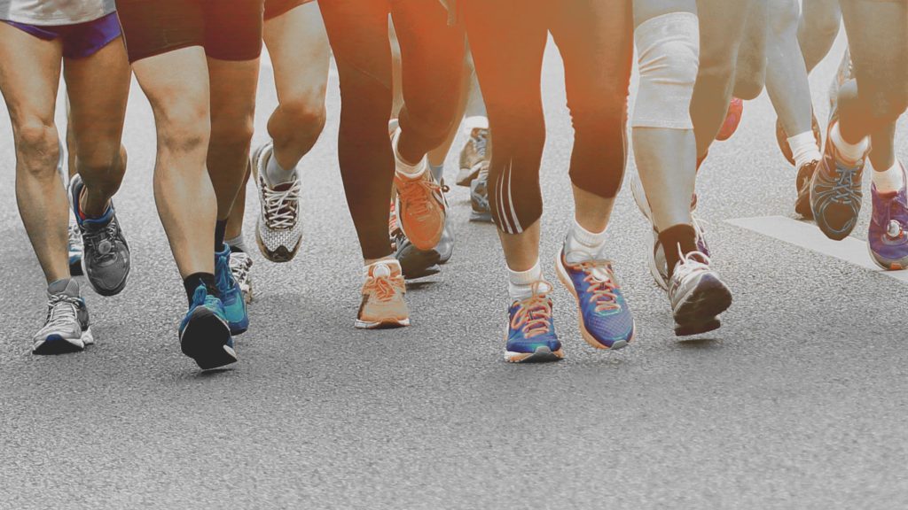 Photo of several people jogging