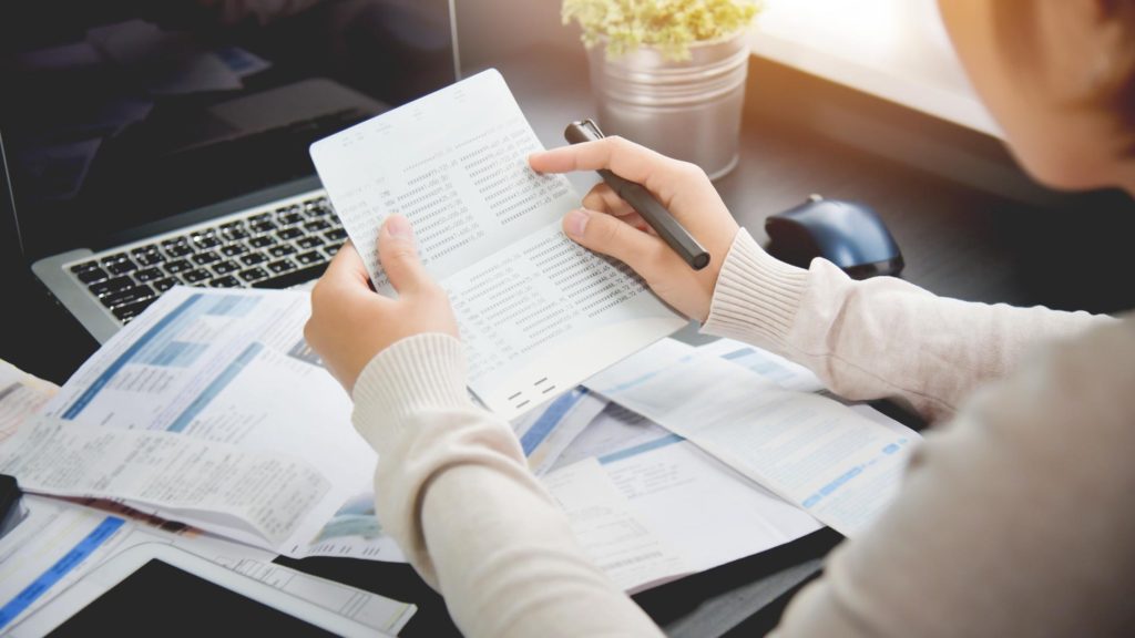 Female working through personal finances planning